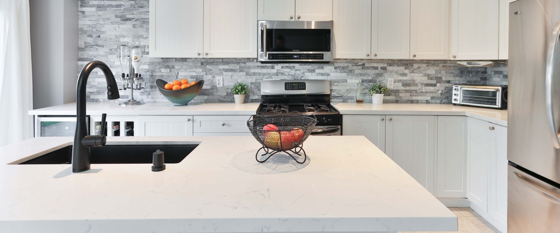 What are the six primary kitchen layout shapes?